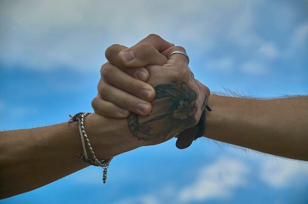 A close-up shot of two hands clasped together, symbolizing trust and unity. The background is blurred, drawing focus to the hands.