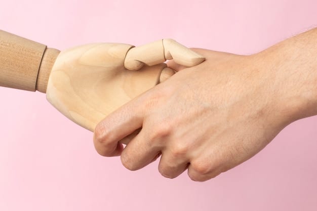 Two hands, one male and one female, gently interlocked on a light-colored table, symbolizing connection and joint effort. The background is slightly blurred, focusing on the hands.