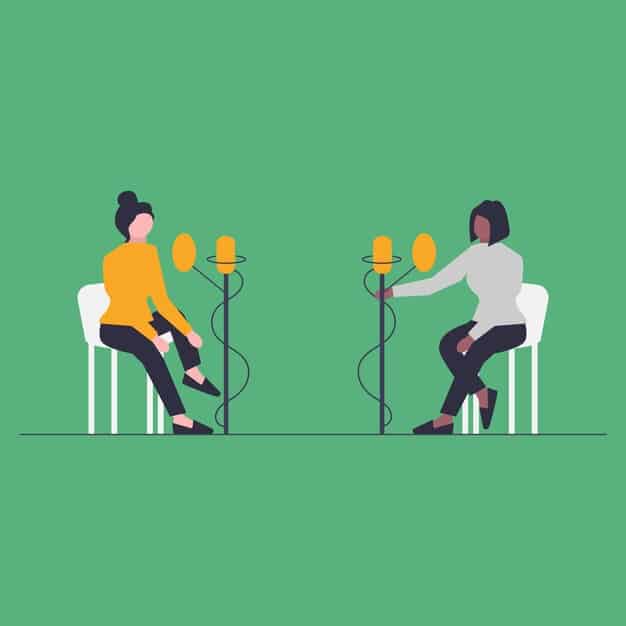 Two people sitting opposite each other, actively listening and mirroring expressions, symbolizing effective communication in therapy.