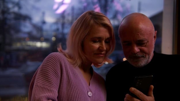 A woman looking distressed while her partner is looking at his phone, symbolizing neglect and emotional detachment within a relationship. The lighting is dim.