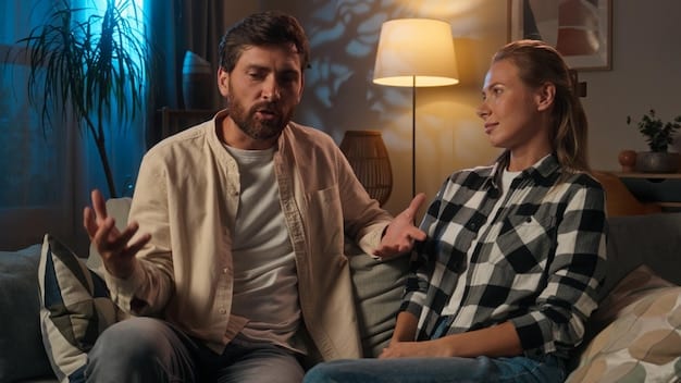 A couple sitting on a sofa, deeply engrossed in conversation, holding hands, signifying open and honest communication about important topics. Soft, warm lighting.