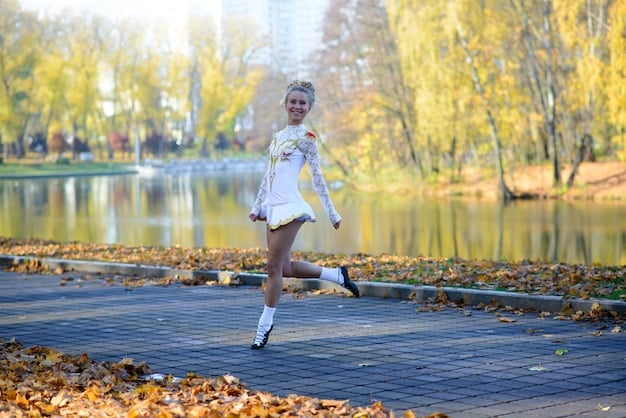 A senior woman with a bright smile, wearing comfortable walking shoes, taking a graceful stride on a paved path in a sun-drenched park, surrounded by lush foliage.