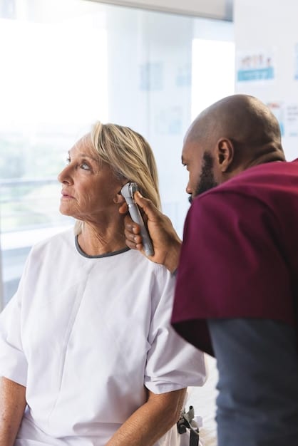 An empathetic audiologist, dressed in a white coat, gently assisting an older woman in a modern, well-lit clinic. The audiologist is demonstrating a hearing aid, and the woman is actively listening, conveying a sense of relief and understanding.