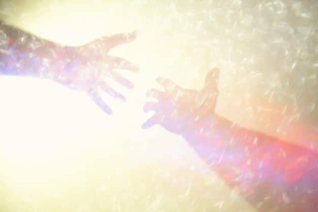 A symbolic image depicting two hands gently interlaced, representing connection, trust, and support. The background is soft and blurred, emphasizing the hands.