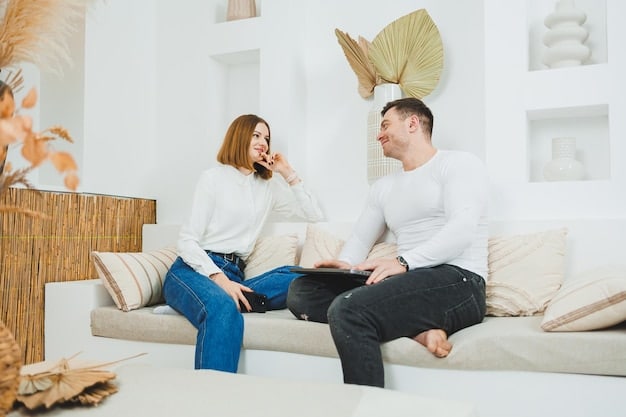 A couple sitting on a couch, engaged in deep conversation, with open body language, symbolizing effective communication and active listening.
