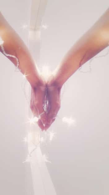 Two hands reaching out to connect, bathed in a soft, ethereal light, symbolizing empathy, support, and profound connection.