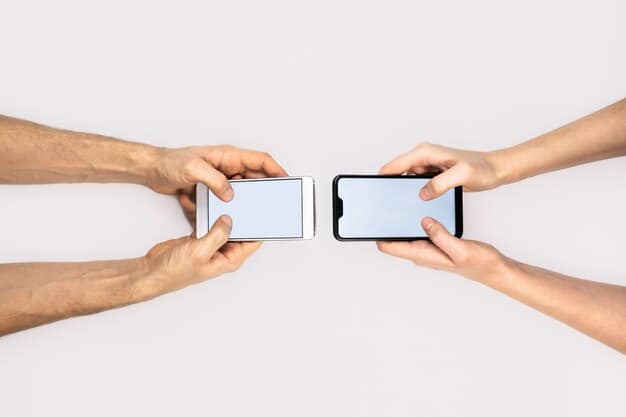A close-up of two hands, one holding a phone displaying social media feeds, and the other gently touching it as if trying to pull it away, symbolizing the struggle between digital distraction and human connection.