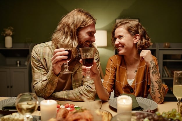 A couple laughing genuinely during a date night, perhaps clinking glasses in a cozy, softly lit restaurant, conveying connection and enjoyment.