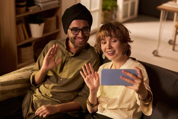 A couple on a video call, smiling and making eye contact, bridging the physical distance through digital nonverbal cues. Soft, warm lighting suggests intimacy.