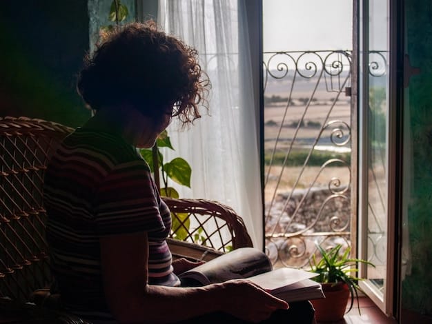 A person enjoying a quiet moment alone, reading a book by a window, representing the importance of individual self-care and personal time.