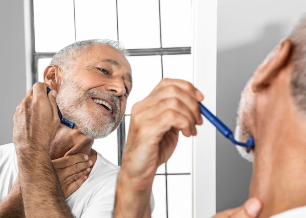 A close-up of a senior person's hand using an electric toothbrush, demonstrating proper technique and highlighting accessible dental care tools.