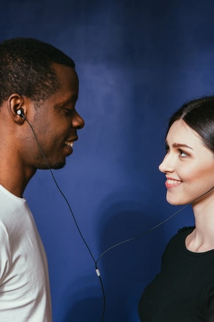 A hands-on visual representation of active listening, with one person leaning in, making direct eye contact, and nodding attentively while the other speaks, symbolizing engagement and empathy.